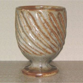 Stoneware goblet with incised spiral decoration.