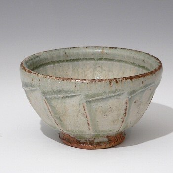 Small facetted bowl, ash glazed celadon with cobalt highlights.