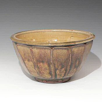 Large deep facetted bowl.
