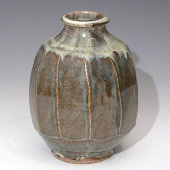 Facetted stoneware vase.