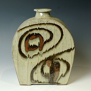 Facetted moulded stoneware bottle