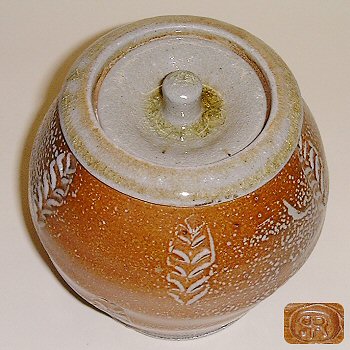 Small salt glazed jar with leaf decoration