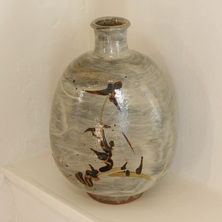 Squared bottle, white slip with iron and manganese decoration