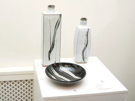 Peter Swanson - slab built bottles and dish with glaze pours