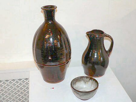 Tall temmoku glazed waisted bottle, temmoku glazed baluster jug, nuka and temmoku tea bowl