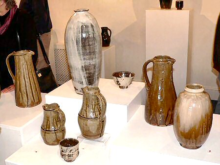 A selection of jugs with a tall bottle vase, tea bowl, yunomi and flattened bottle vase