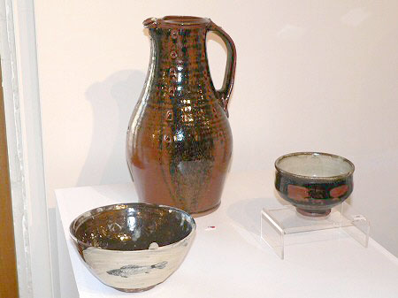Temmoku glazed baluster jug, hakeme over temmoku bowl with fish decoration, tea bowl with thumb wipe decoration
