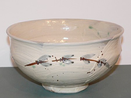 Bowl with brushed slip decoration