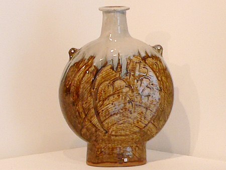 Large pilgrim bottle, brushed slip with engraved decoration