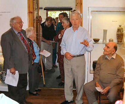 Reg Moon, potter and owner of the Gallery Upstairs giving his opening speech at the exhibition pre-view. David Leach to his right and Henry Sandon to the left.