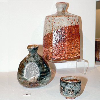 Oval facetted bottle, sake bottle and cup