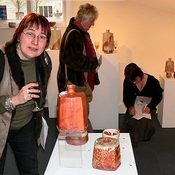 Exhibition preview - Lisa signing an exhibition programme