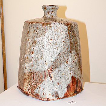 Large facetted shino glazed bottle