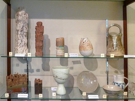Top row - Two Geoffrey Eastop pots, two Alan Wallwork pots, Takeshi Yasuda. Bottom Row - Two Bryan Newman sculptures, Joanna Constantinides, three Ursula Mommens pots