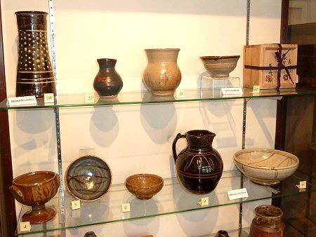 Top row - Three Bernard Leach pots, Shoji Hamada. Bottom row - Michael Cardew