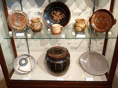 Top row - Two Sid Tustin pots, Ray Finch mug, Peter Disk plate, Reg. LLoyd, Sid Tustin. Bottom row - Michael Cardew, Eddie Hopkins, Marianne de Trey