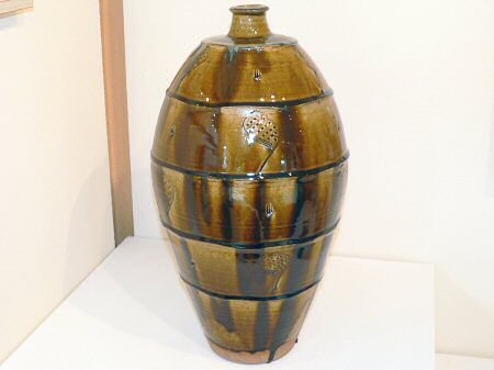 Large ash glazed bottle with concentric ring decoration