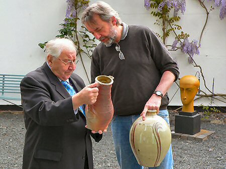 Henry Sandon and Phil Rogers discussing the merits of a large medieval style jug