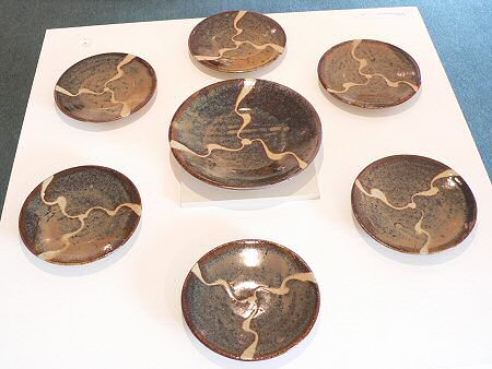 Set of ash glazed plates