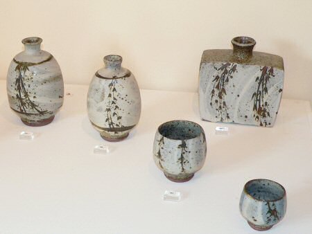 Matte glazed pots with iron decoration