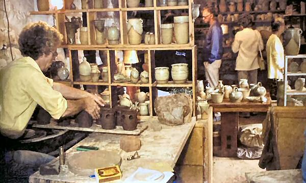 John Vasey with customers in Wayside Pottery