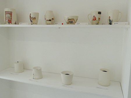 Top shelf Helen Beard, bottom shelf Dan Kelly