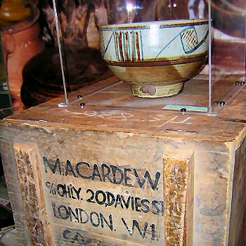Michael Cardew rose bowl standing up a packing case from Africa