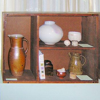 Pots in one of Bills wooden display cases
