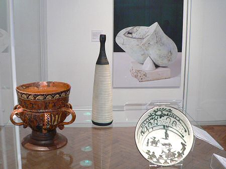 Picasso bowl, Thomas Toft cup, image of a Gordon Baldwin vessel behind