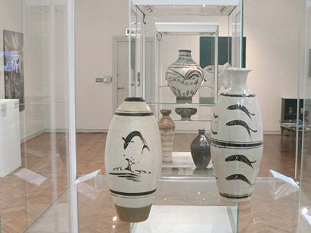Leaping salmon vases by Bernard Leach
