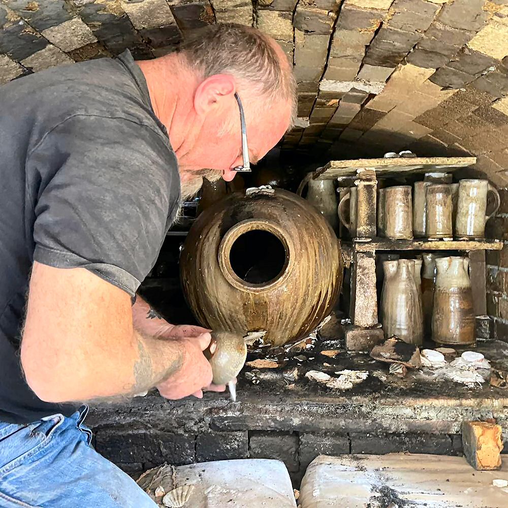 Nic Collins working on a small bowl