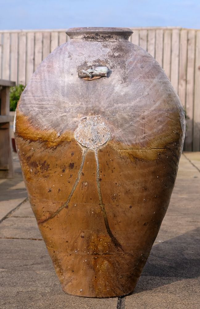 Nic Collins - Huge jar, this face was uppermost. The cones have melted onto the jar