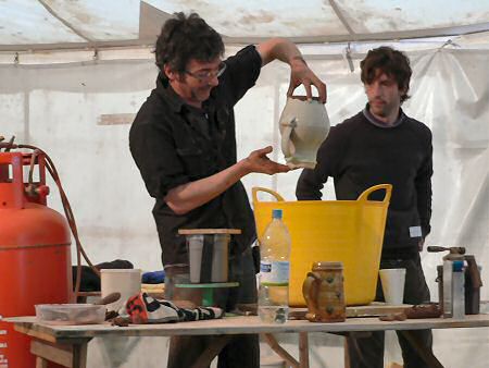 Matt Grimmitt helping Doug Fitch at Clay Art 2008