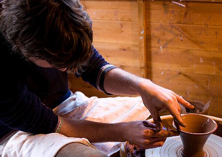 Matt Grimmitt throwing a mug