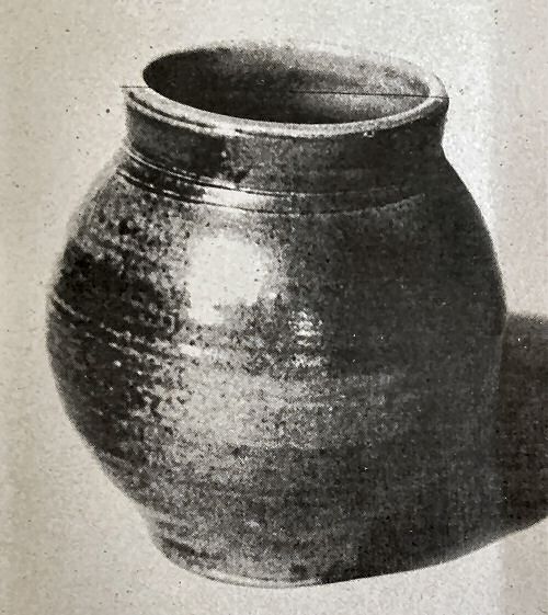 Unglazed jar, fired to 1300C, glazed by flame and ash