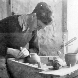 Alex Sharp at the Leach Pottery ca. 1950