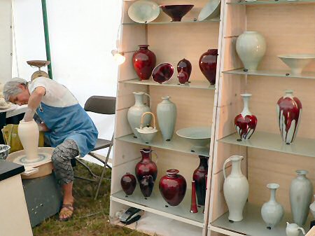 CPA Chairman Karen Bunting throwing a vase