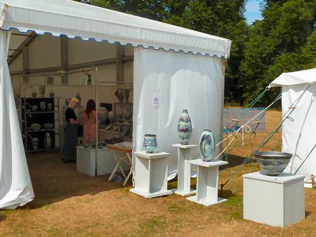 Roger Cockram pots outside the Derek Emms tent
