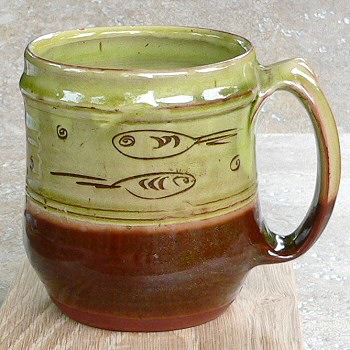 Old slipware tankard decorated by Pat Groom