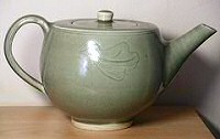 Teapot with engraved oak leaf