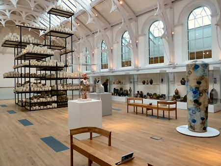 View across the main hall towards the Claire Twomey 10,000 bowl installation