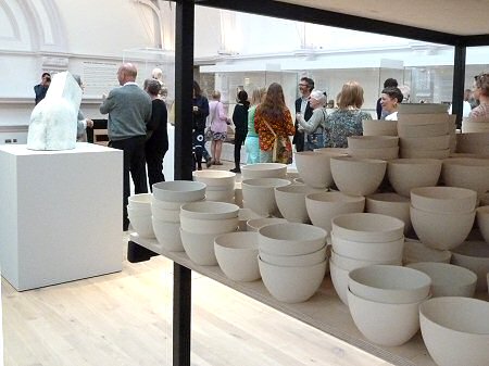 Through the Claire Twomey 10,000 bowl installation