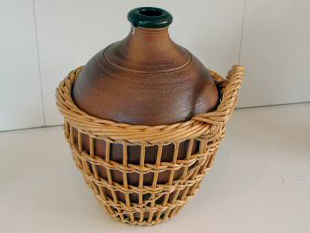 John Leach cider jar in basket