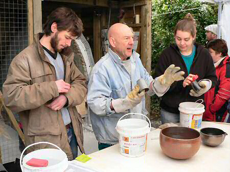 Jack explaining while Jacob Bodilly and Kat Livesey clean off the hot pots