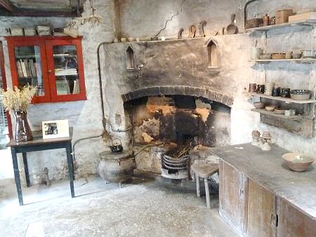 The fireplace in the old pottery building, Bernard always sat on the scuttle where the teapot stands