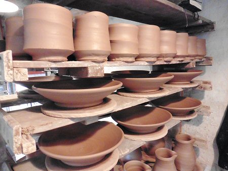 Pots thrown on a Leach kick wheel