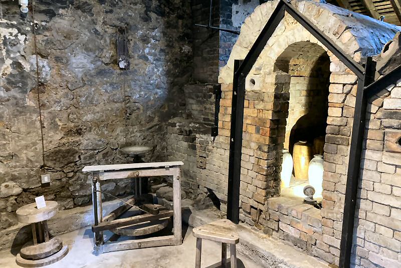 Janet Leach's wheel and an old kick wheel next to the old climbing kiln