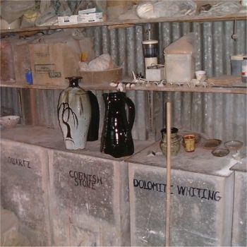 Glaze bins and two large pots with firing defects
