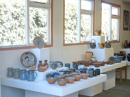 Pots for sale in the showroom at Lowerdown Pottery