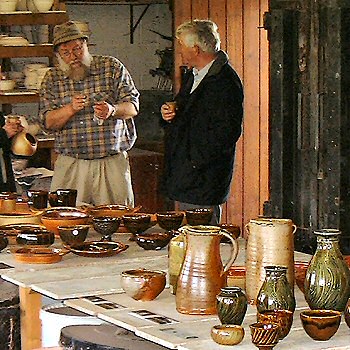 John Leach discussing with visitors